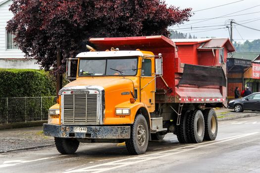 VILLARRICA, CHILE - NOVEMBER 20, 2015: Dump truck Freightliner FLD in the town street.