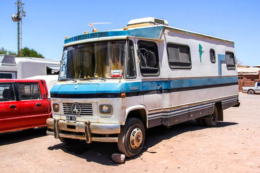 SAN PEDRO DE ATACAMA, CHILE - NOVEMBER 17, 2015: Old campervan Mercedes-Benz 608D in the town street.