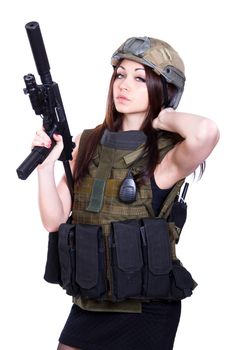 Woman in a military camouflage with a submachine gun isolated over white background