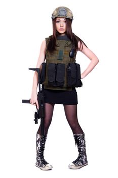 Woman in a military camouflage with a submachine gun isolated over white background