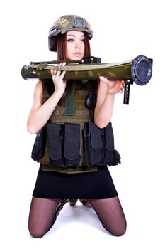 Woman in a military camouflage with a grenade launcher isolated over white background