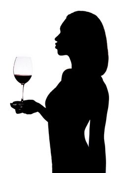 Silhouette of a woman holding the wineglass