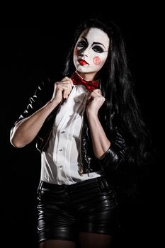 Woman with a Saw film cosplay makeup over black background