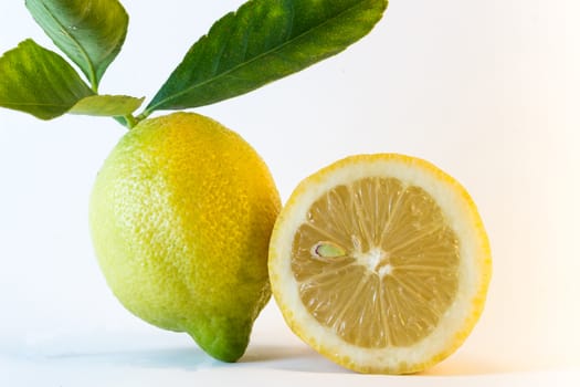 Fresh lemon over white background.