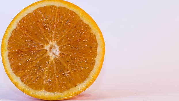 Fresh juicy slice of orange on white background