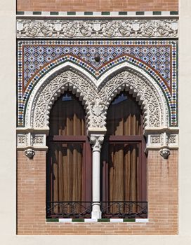 Double ornate window in moorish style, Sevilla, Spain