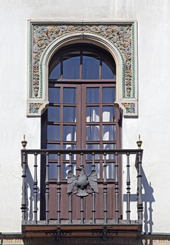 Decorative balcony of a house in Seville, Spain