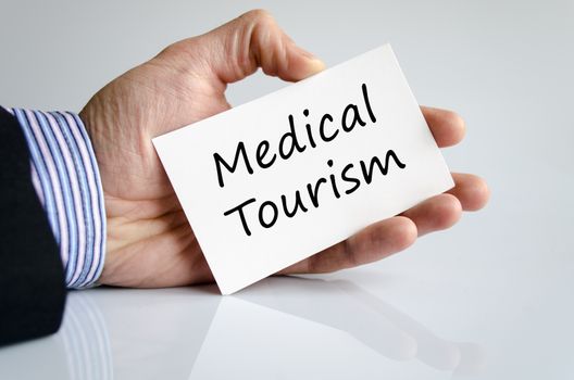 Medical tourism text concept isolated over white background