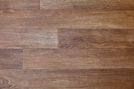 Close-up of new linoleum with parquet pattern, background