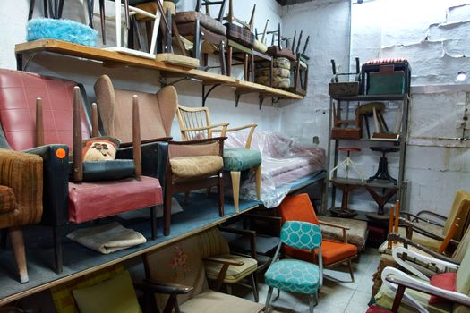 Classical vintage antiques shop with many attractive old items                               