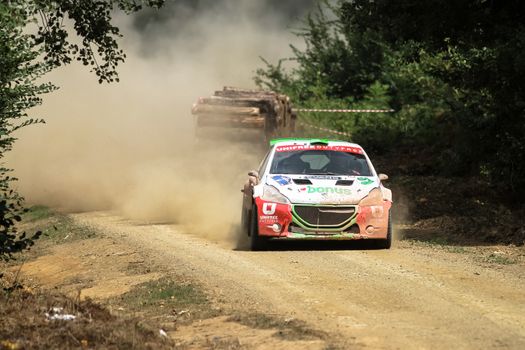 KOCAELI, TURKEY - AUGUST 23, 2015: Ercan Kazaz with Peugeot 208 R5 of Bonus Unifree Parkur Racing Team in Kocaeli Rally 2015