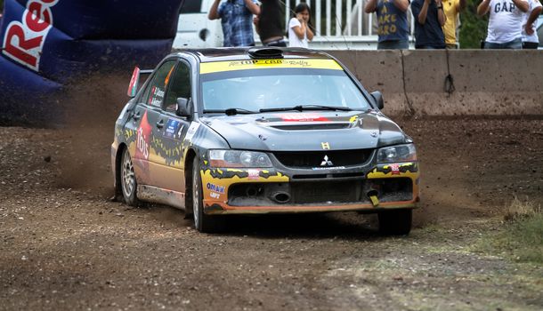 KOCAELI, TURKEY - AUGUST 23, 2015: Burak Cukurova with Mitsubishi Evo IX in Kocaeli Rally 2015