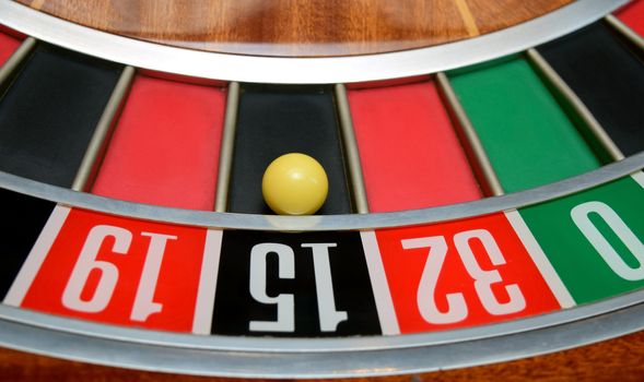 ball in winning number fifteen at roulette wheel
