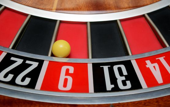 ball in winning number nine at roulette wheel