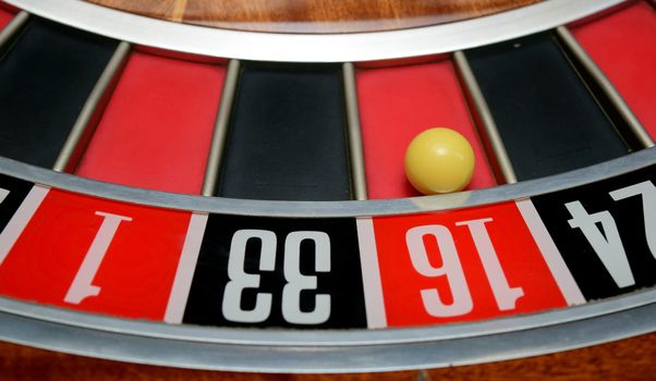 ball in winning number sixteen at roulette wheel