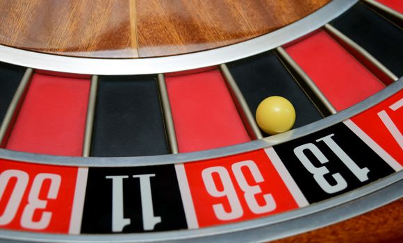 ball in winning number thirteen at roulette wheel