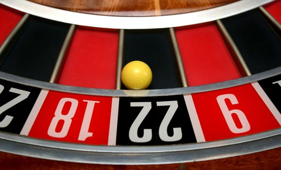 ball in winning number twenty-two at roulette wheel