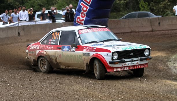 KOCAELI, TURKEY - AUGUST 23, 2015: Engin Kap with Ford Escort MK2 of Bonus Unifree Parkur Racing Team in Kocaeli Rally 2015