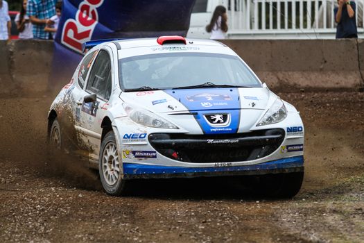 KOCAELI, TURKEY - AUGUST 23, 2015: Yagiz Avci with Peugeot 207 S2000 of Neo Motorspor Team in Kocaeli Rally 2015