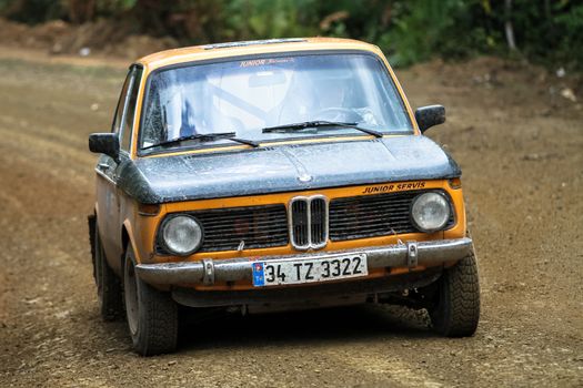 KOCAELI, TURKEY - AUGUST 23, 2015: Haydar Guclu with BMW 2002 in Kocaeli Rally 2015