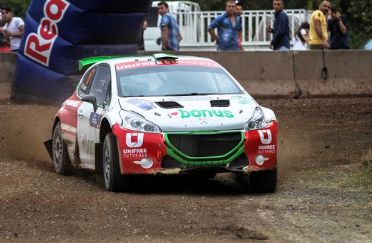KOCAELI, TURKEY - AUGUST 23, 2015: Ercan Kazaz with Peugeot 208 R5 of Bonus Unifree Parkur Racing Team in Kocaeli Rally 2015