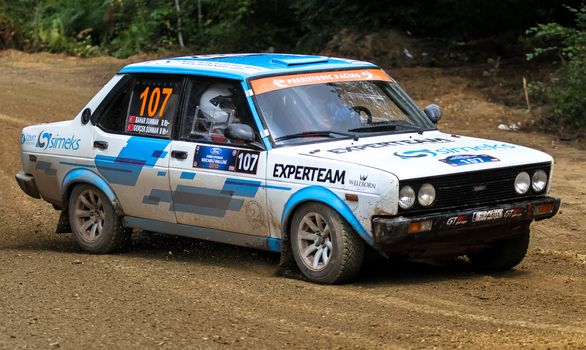 KOCAELI, TURKEY - AUGUST 23, 2015: Gercek Sunman with Fiat 131 in Kocaeli Rally 2015