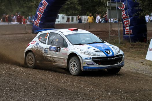 KOCAELI, TURKEY - AUGUST 23, 2015: Yagiz Avci with Peugeot 207 S2000 of Neo Motorspor Team in Kocaeli Rally 2015