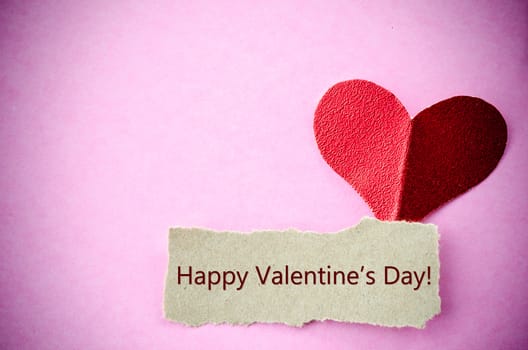 Happy Valentine's Day card with paper heart shape and free space.
