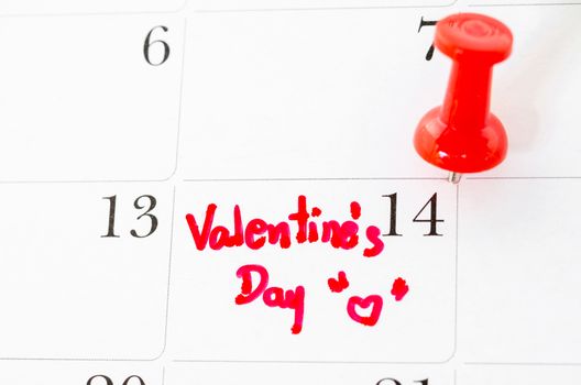 Calendar page with the red hearts on February 14 of Saint Valentines day.