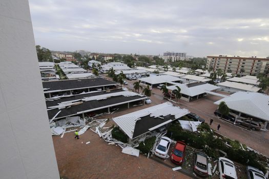 UNITED STATES, Siesta Key: A heavily damaged car park is seen in the aftermath of a tornado, on Midnight Pass Road in Siesta Key, Florida, on January 17, 2016. At least two people are dead near Sarasota after tornadoes and severe thunderstorms crossed central and South Florida on January 17, 2016. 