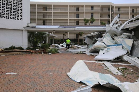 UNITED STATES, Siesta Key: A heavily damaged car park is seen in the aftermath of a tornado, on Midnight Pass Road in Siesta Key, Florida, on January 17, 2016. At least two people are dead near Sarasota after tornadoes and severe thunderstorms crossed central and South Florida on January 17, 2016. 