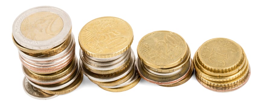 Four piles of coins isolated on white background, top view