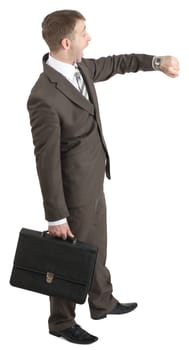 Businessman with briefcase looking at his watch isolated on white background, side view