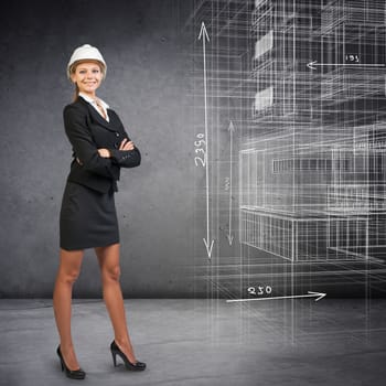 Businesswoman in helemet with 3d model of building sketch