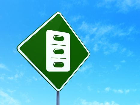 Health concept: Pills Blister on green road highway sign, clear blue sky background, 3d render