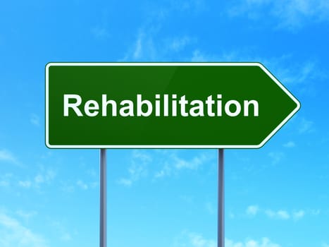 Healthcare concept: Rehabilitation on green road highway sign, clear blue sky background, 3d render