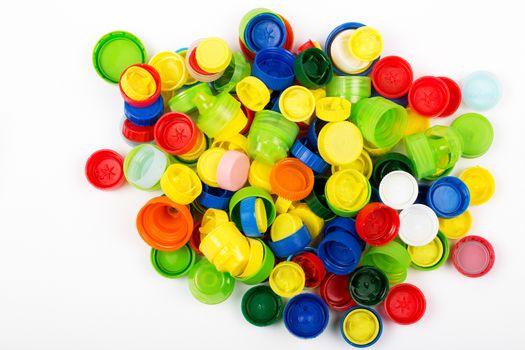 Plastic corks from bottles on a white background