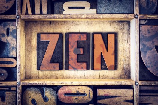The word "Zen" written in vintage wooden letterpress type.