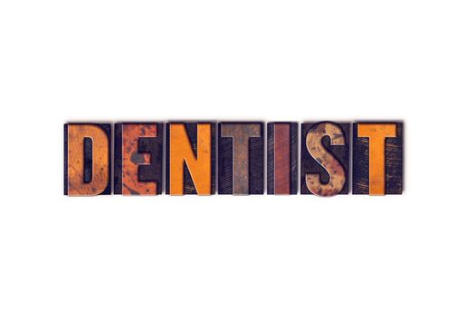 The word "Dentist" written in isolated vintage wooden letterpress type on a white background.