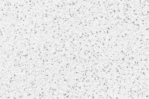 Close up of white pebble stones wall texture for background