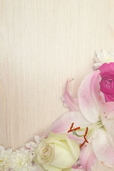 Lily flowers on wooden background with copy space, valentines day background