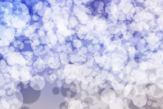 Multicolored blue defocused bokeh lights for texture or background