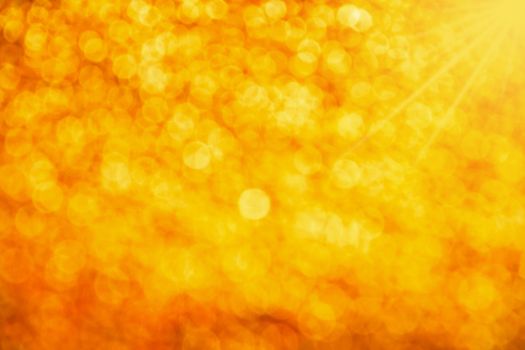 Golden glitter bright magic light circles summer sunshine abstract blur effect background