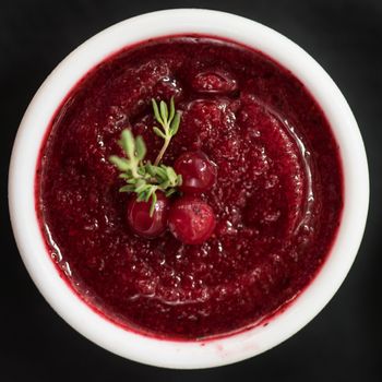 Refreshing cranberry sorbet at white bowl