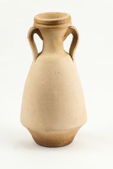 Ancient terracotta vase isolated on white background