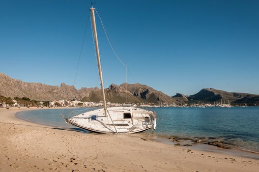 Boat stranded on the beach after a storm