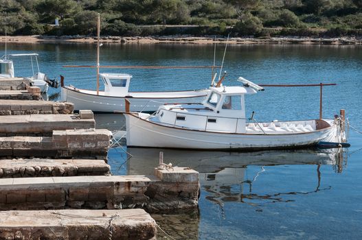 Boats moored at the pier