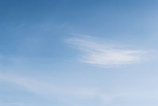 white fluffy clouds in the blue sky, for background