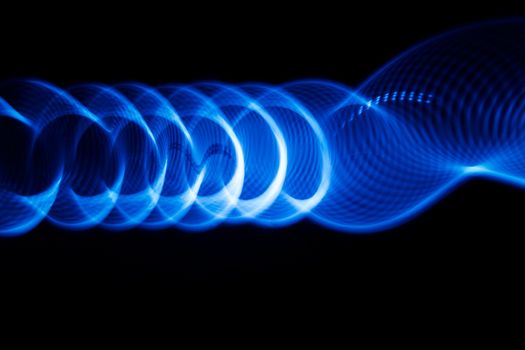 Sound waves in the visible blue color in the dark