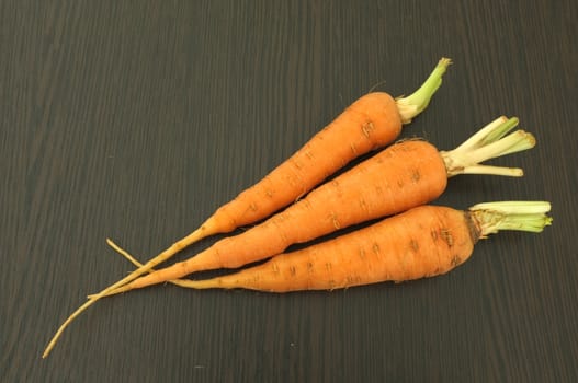 Carrot on wooden background